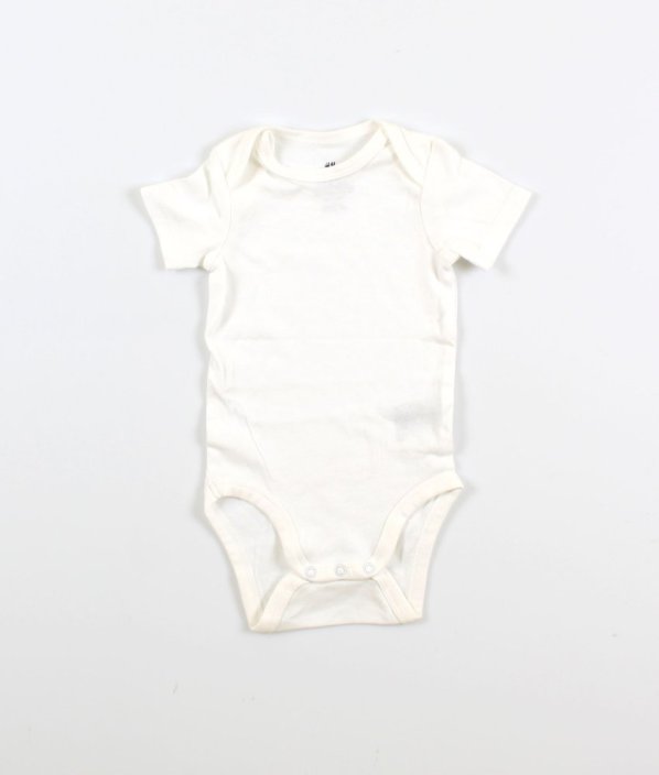 Biele body z biobavlny H&M
